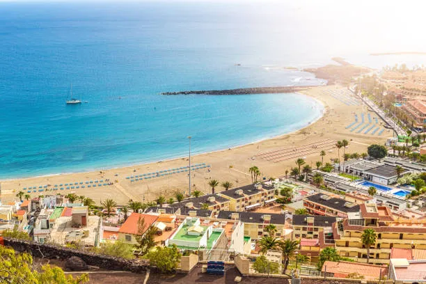 Harbour with fishing boats and mountains behind Los Cristianos, Tenerife
